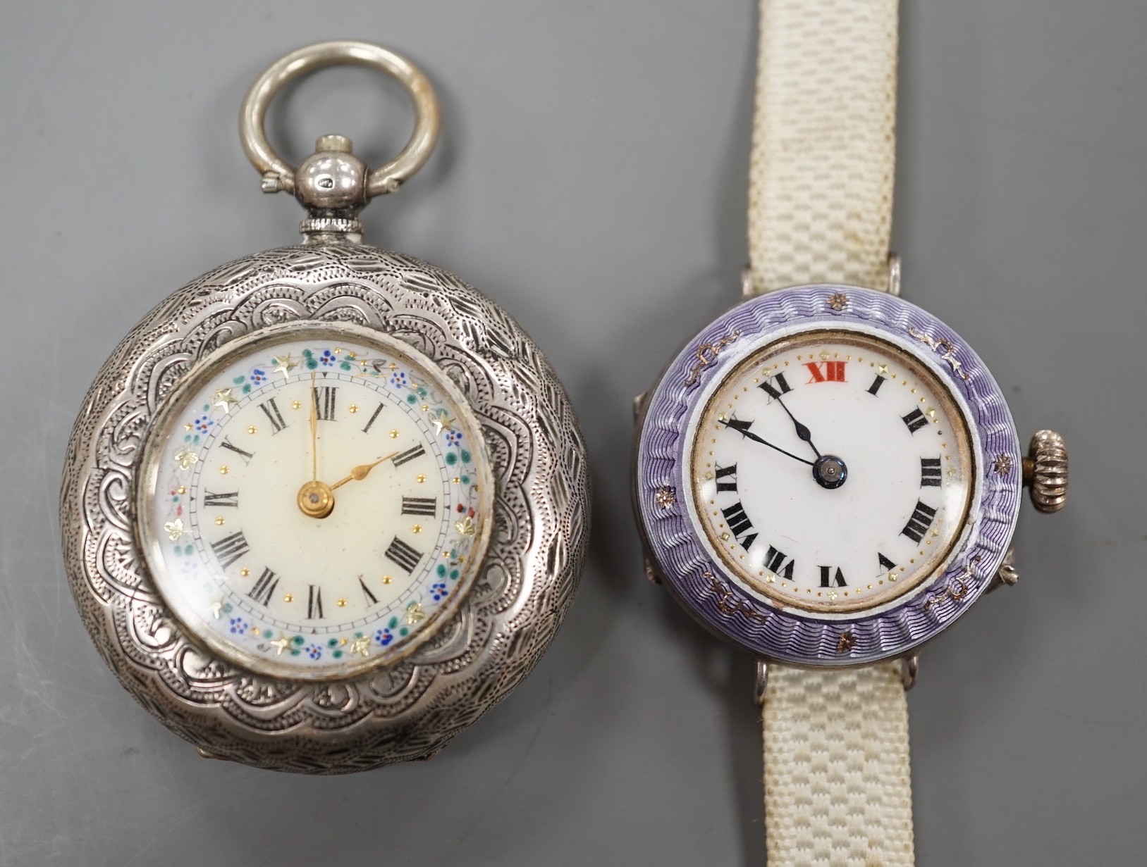 A lady's early 20th century silver and enamel manual wind wrist watch and an 800 standard white metal fob watch.